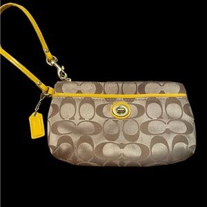 Coach tan and yellow wristlet